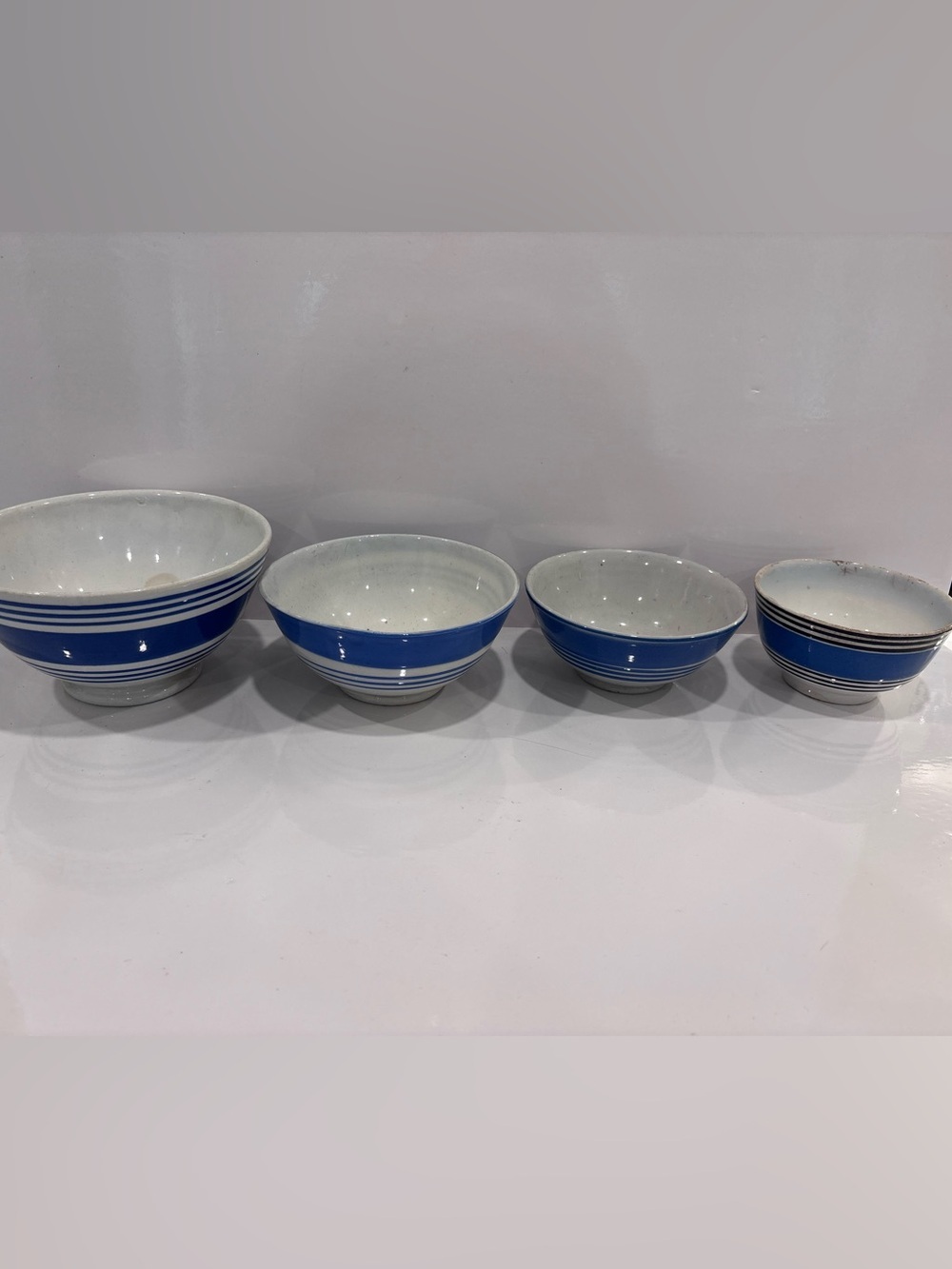 Vintage set of 4 blue banded pottery mixing bowls made in England
